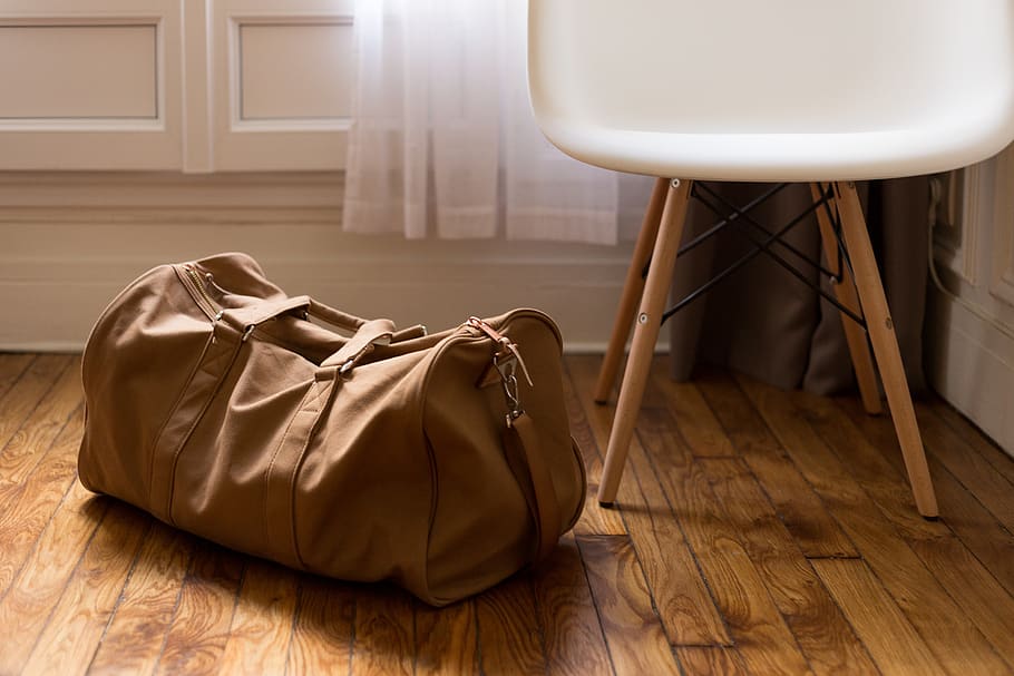 luggage-duffle-bag-bag-hardwood-floors-room